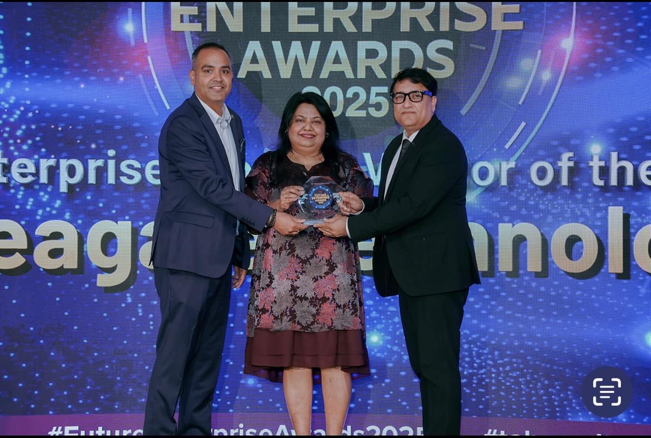 Two Seagate representatives receive the Enterprise Storage Vendor of the Year award during the Future Enterprise Awards 2025.