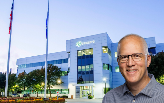 Seagate VP Mike Leitner, wearing glasses and a collared shirt, stands in front of a Seagate corporate building.